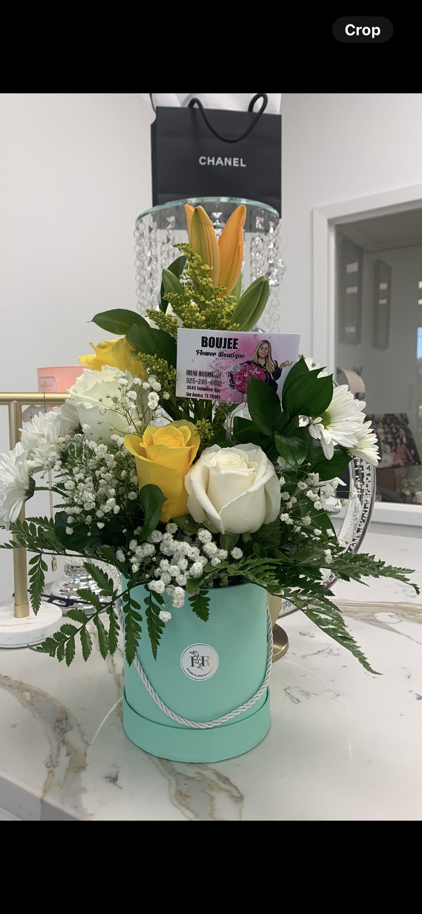 ROUND BOX WITH ROSES ARRANGEMENT