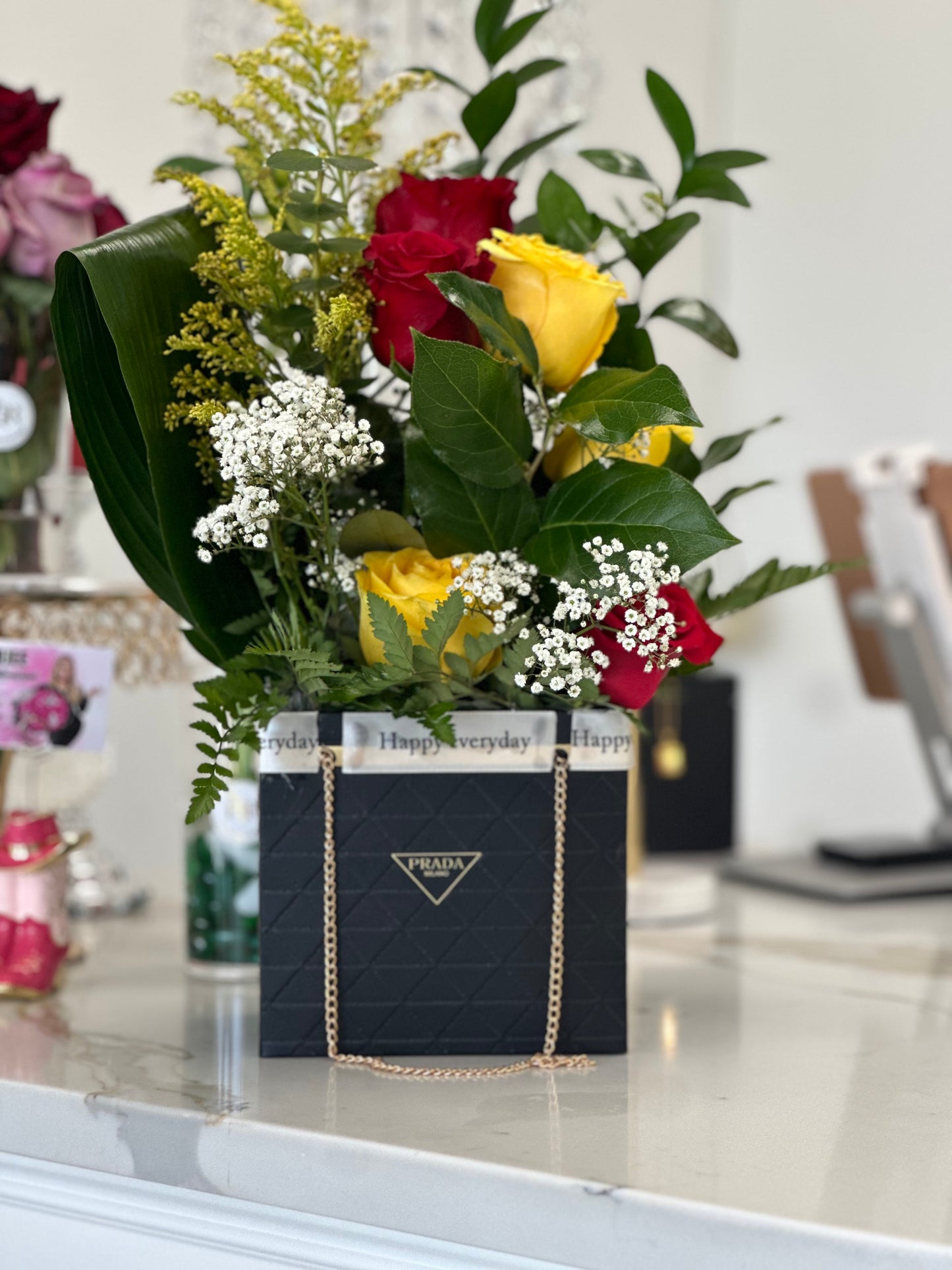 ASSORTMENT IN DESIGNER BAG